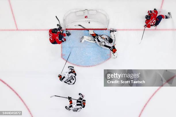 Sonny Milano of the Washington Capitals scores a goal against Felix Sandstrom of the Philadelphia Flyers during the third period of the game at...