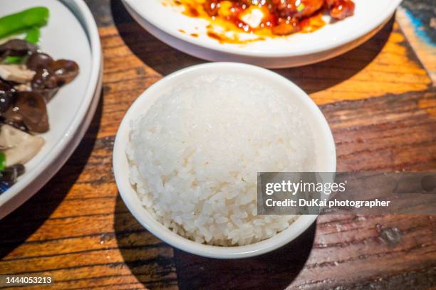 Hi Resolution Cooked Rice 374 A Bowl Of Cooked White Rice With Chopsticks Stock Photos, High-Res ...