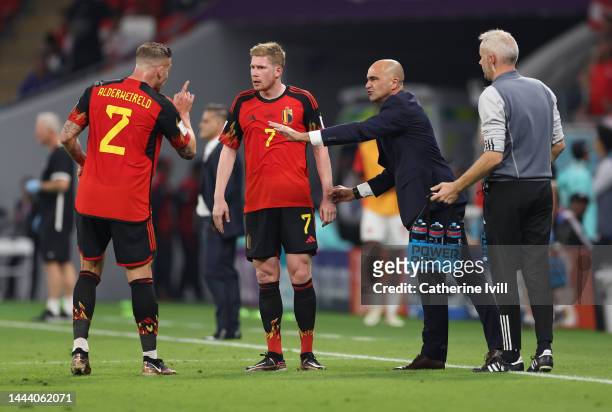 Kevin De Bruyne of Belgium and Roberto Martinez, head coach of Belgium speak with Toby Alderweireld during the FIFA World Cup Qatar 2022 Group F...