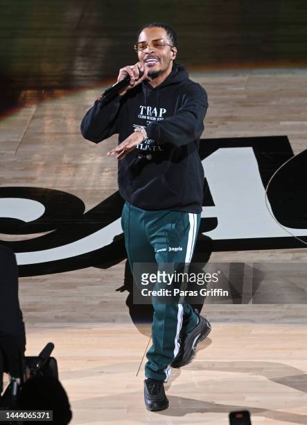 Rapper T.I. Performs at halftime during the game between the Sacramento Kings and the Atlanta Hawks at State Farm Arena on November 23, 2022 in...