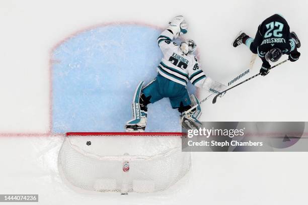 Oliver Bjorkstrand of the Seattle Kraken scores a goal during the third period against the Kaapo Kahkonen of the San Jose Sharks at Climate Pledge...