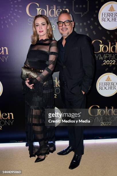 Anette Michel and Gregorio Jimenez pose for a photo during the red carpet for the presentation of Golden Symphony Ferrero Rocher at Teatro Telcel on...