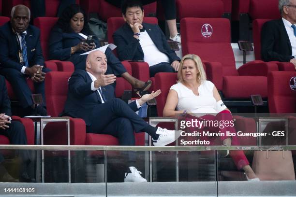 President Gianni Infantino , talks to Federal Minister of the Interior and Community Nancy Faeser of DFB during the FIFA World Cup Qatar 2022 Group E...