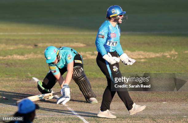 Tegan McPharlin of the Adelaide Strikers celebrates stumping Georgia Voll of the Brisbane Heat for 13 runs off the bowling of Amanda-Jade Wellington...