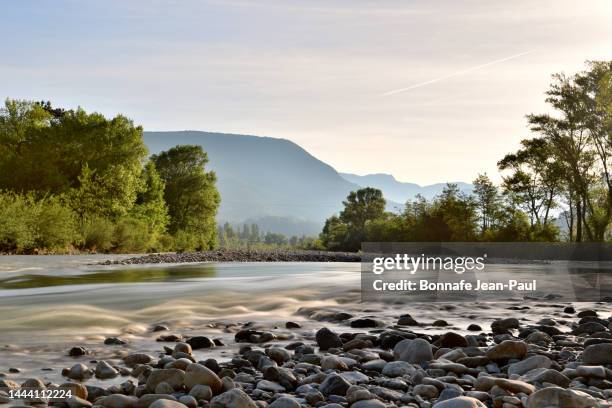 long exposure by a river drôme - drome stock pictures, royalty-free photos & images