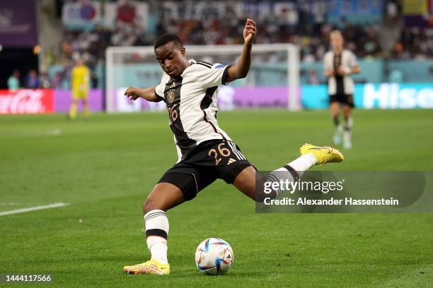 Youssoufa Mokouko of Germany runs with the ball during the FIFA World Cup Qatar 2022 Group E match between Germany and Japan at Khalifa International...