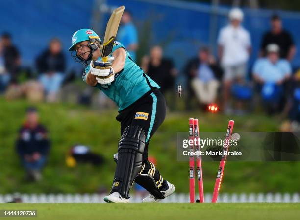 Nicola Hancock of the Brisbane Heat bowled by Deandra Dottin of the Adelaide Strikers during the Women's Big Bash League match between the Adelaide...