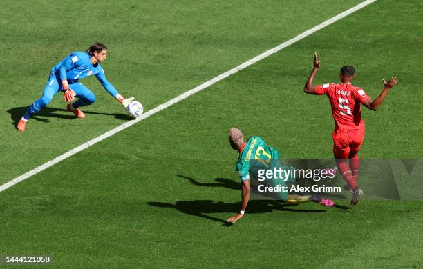 Yann Sommer of Switzerland saves an attempt by Eric Maxim Choupo-Moting of Cameroon during the FIFA World Cup Qatar 2022 Group G match between...