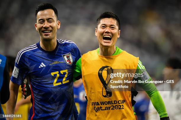 Maya Yoshida and Goalkeeper Eiji Kawashima of Japan celebrate their team's win of the FIFA World Cup Qatar 2022 Group E match between Germany and...