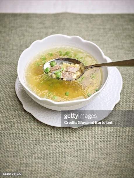 pasta in broth with peas and chicken livers - green pea soup stock pictures, royalty-free photos & images