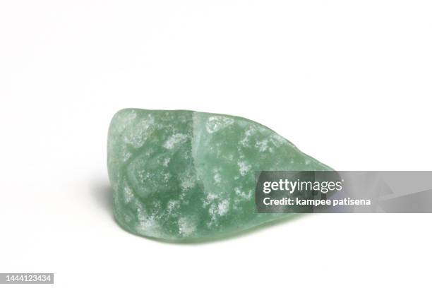 green agate rocks on white background - ónix fotografías e imágenes de stock