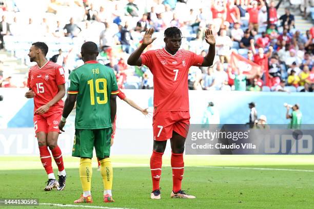 Breel Embolo of Switzerland celebrates scoring their first goal during the FIFA World Cup Qatar 2022 Group G match between Switzerland and Cameroon...