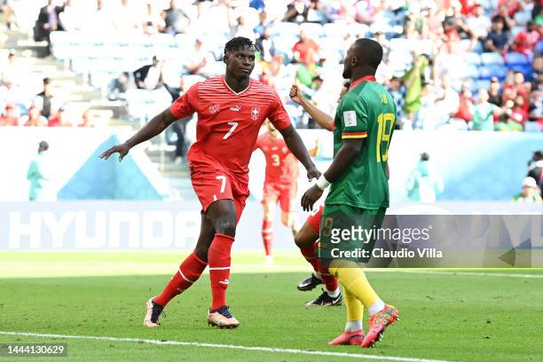Breel Embolo of Switzerland celebrates scoring their first goal during the FIFA World Cup Qatar 2022 Group G match between Switzerland and Cameroon...