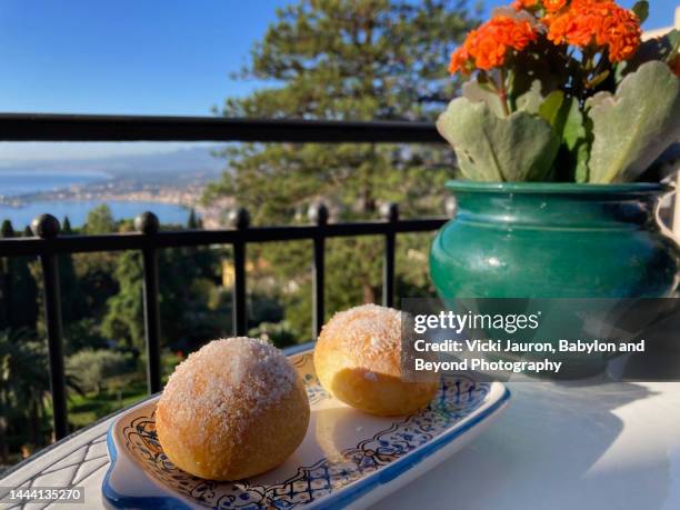 sweet breakfast brioches against view of ionian sea - heritage round two imagens e fotografias de stock