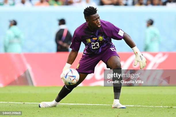 Andre Onana of Cameroon clears the ball during the FIFA World Cup Qatar 2022 Group G match between Switzerland and Cameroon at Al Janoub Stadium on...