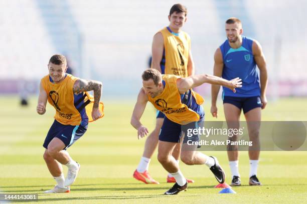 Harry Kane and Kieran Trippier of England train during the England Training Session at Al Wakrah SC Stadium on November 24, 2022 in Doha, Qatar.