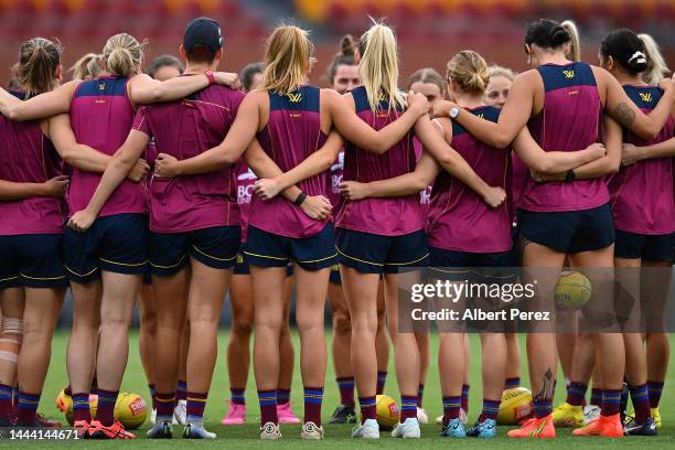 The Brisbane Lions huddle during a Brisbane Lions AFLW training session at Brighton Homes Arena on November 24, 2022 in Brisbane, Australia.