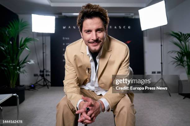 The singer Manuel Carrasco poses during an interview for Europa Press at the Hotel ME Madrid Reina Victoria, on 24 November, 2022 in Madrid, Spain....