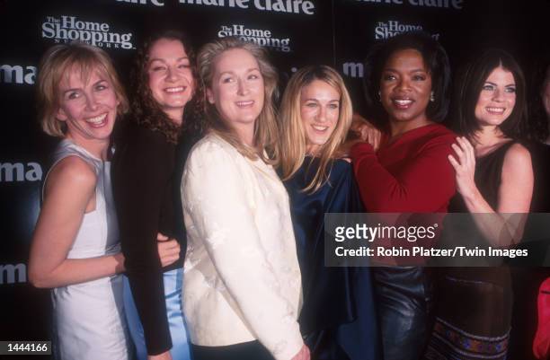 Left to right, Trudie Styler, Joan Osborne, Meryl Streep, Sarah Jessica Parker, Oprah Winfrey, and Yasmine Bleeth pose for photographers at the Marie...