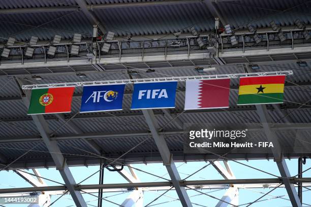 The Portugal, AFC, FIFA, Qatar and Ghana flags are seen in the roof prior to the FIFA World Cup Qatar 2022 Group H match between Portugal and Ghana...