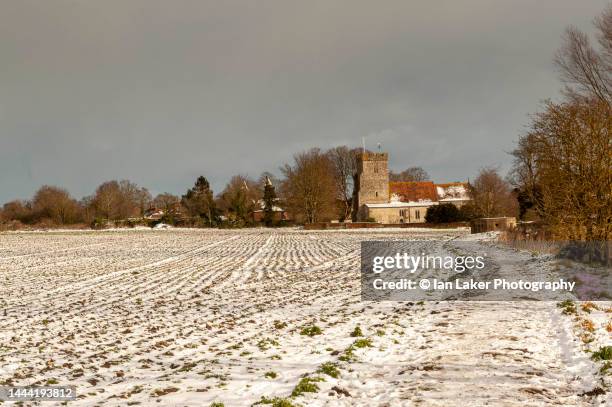 wickhambreaux, kent, england, uk. 10 february 2021. distant view of wickhambreaux church in the snow. - south east england stock pictures, royalty-free photos & images