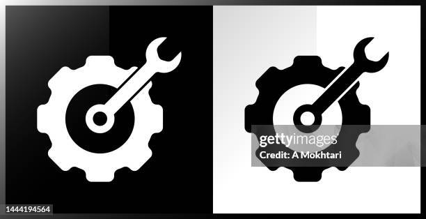 cog and spanner icon. - workshop tools white background stock illustrations