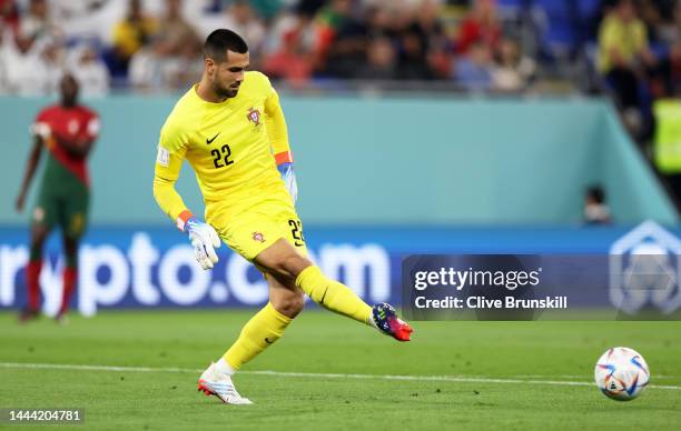 Diogo Costa of Portugal passes the ball during the FIFA World Cup Qatar 2022 Group H match between Portugal and Ghana at Stadium 974 on November 24,...