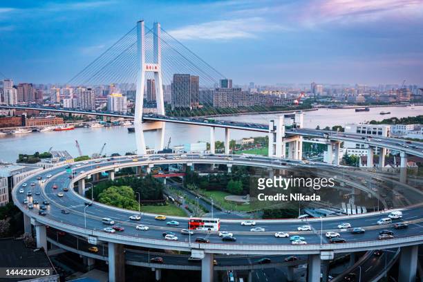 highway and nanpu bridge in shanghai, china - traffic management stock pictures, royalty-free photos & images