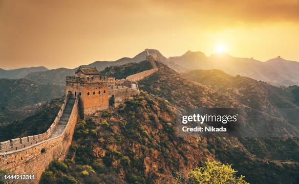 sunrise at the great wall of china - great wall of china stock pictures, royalty-free photos & images