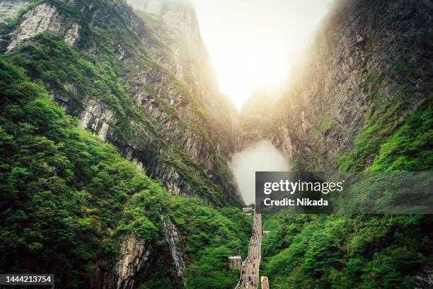 heaven gate cave of tianmen mountain, china - tianmen stock pictures, royalty-free photos & images