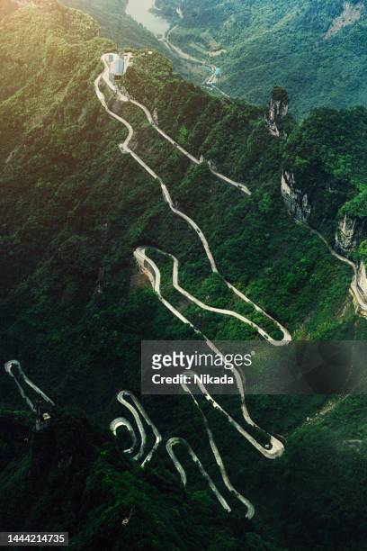 view of winding road of tianmen mountain national park, hunan province, china - zhangjiajie national forest park stock pictures, royalty-free photos & images