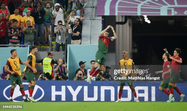 Cristiano Ronaldo of Portugal celebrates after scoring their team's first goal via a penalty during the FIFA World Cup Qatar 2022 Group H match...