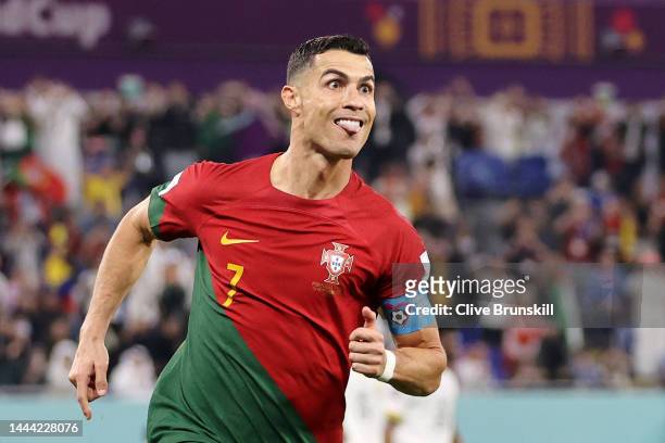 Cristiano Ronaldo of Portugal celebrates after scoring their team's first goal via a penalty during the FIFA World Cup Qatar 2022 Group H match...