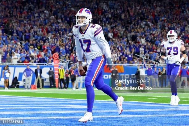Josh Allen of the Buffalo Bills celebrates after rushes for a touchdown against the Detroit Lions during the second quarter at Ford Field on November...