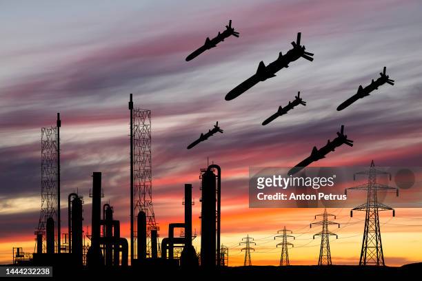 power station and cruise missiles. destruction of ukraine's power industry - missile strike stock pictures, royalty-free photos & images