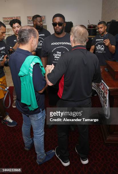 Sean "Diddy" Combs , Ron Book and Rev. Ronald Brummitt celebrated Thanksgiving Day at The Caring Place in Miami on November 24, 2022 in Miami,...