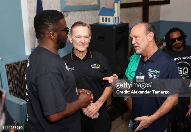 Sean "Diddy" Combs, Rev. Ronald Brummitt and Ron Book celebrated Thanksgiving Day at The Caring Place in Miami on November 24, 2022 in Miami, Florida.