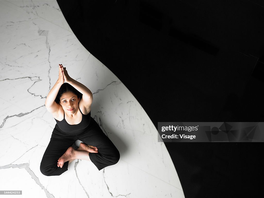 Portrait of a woman in Mountain pose, Studio shot