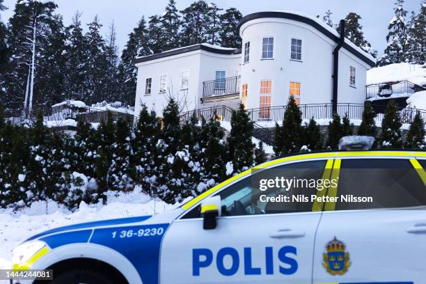 Police at the house where a married couple suspected of gross illegal intelligence activities was arrested in a spectacular raid involving Black Hawk...