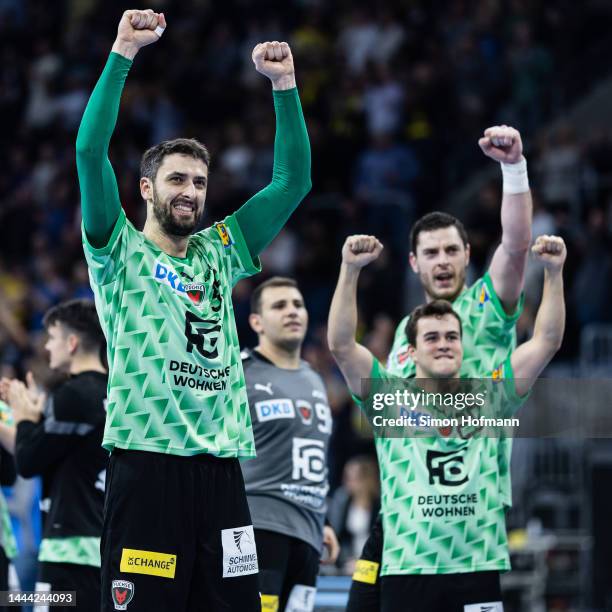 Marko Kopljar, Tim Freihöfer and Mijajlo Marsenic of Berlin celebrate winning during the LIQUI MOLY HBL match between Rhein-Neckar Löwen and Füchse...