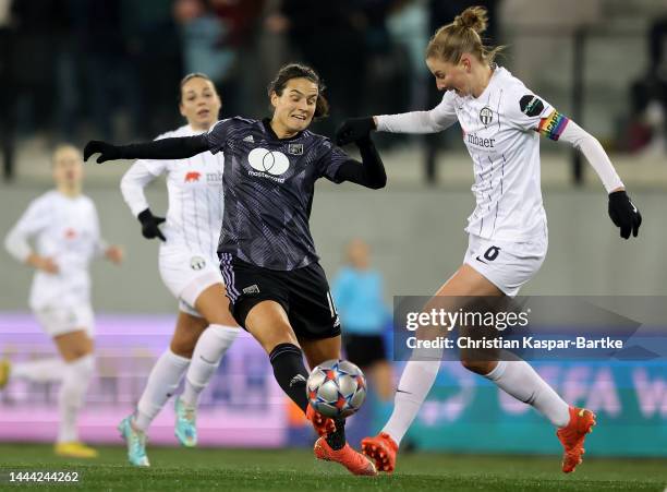 Julia Stierli of FC Zürich Frauen challenges Dzsenifer Marozsán of Olympique Lyonnais during the UEFA Women's Champions League group C match between...