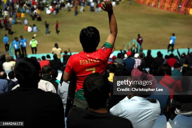 Doha workers and Football fans watch the match between Portugal and Ghana at the Industrial Area Fan Zone in the Asian Town Cricket Stadium on...