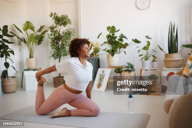 fitness woman preparing for exercising in the morning - pilates stock pictures, royalty-free photos & images