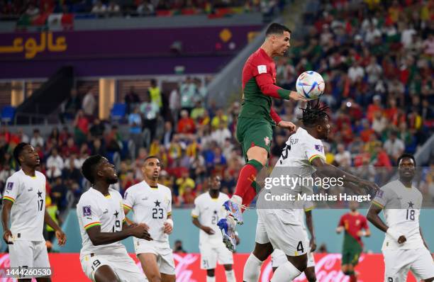 Cristiano Ronaldo of Portugal competes for a header against Mohammed Salisu of Ghana during the FIFA World Cup Qatar 2022 Group H match between...