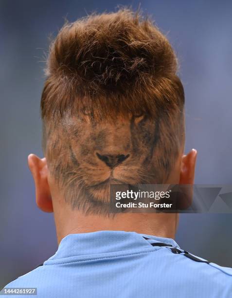 The Lion tattoo on the back of the head of Uruguay goalkeper Sebastian Sosa during the FIFA World Cup Qatar 2022 Group H match between Uruguay and...