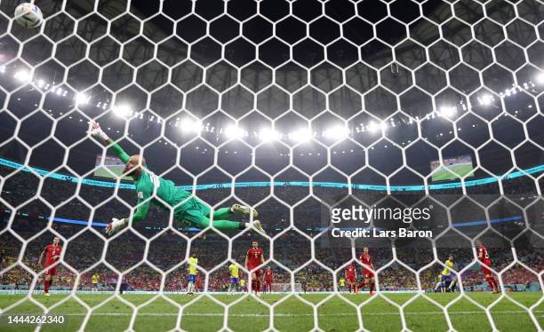 Vanja Milinkovic-Savic of Serbia defends a Brazil attempt during the FIFA World Cup Qatar 2022 Group G match between Brazil and Serbia at Lusail...