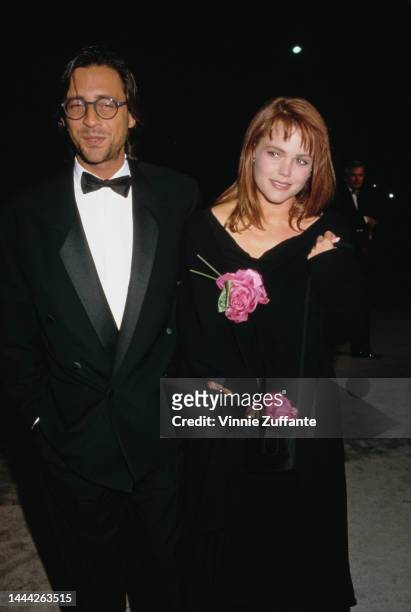 Belinda Carlisle of The Go-Go's and husband Morgan Mason attend the Cocktail Reception to Celebrate Giorgio Armani's Spring-Summer '88 Collection on...