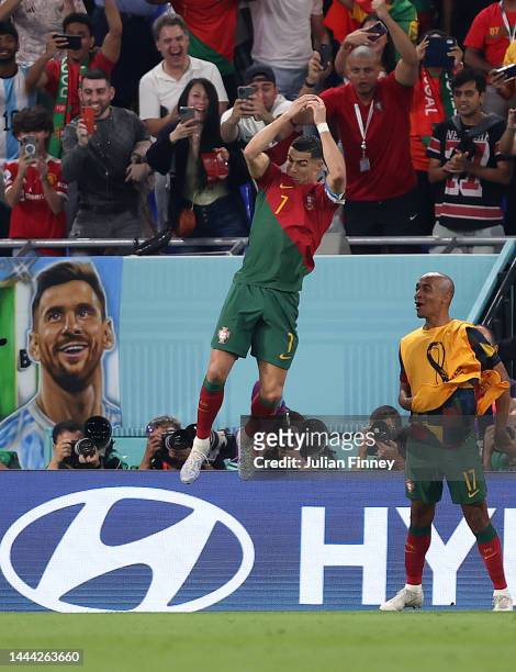 Cristiano Ronaldo of Portugal celebrates scoring a penalty during the FIFA World Cup Qatar 2022 Group H match between Portugal and Ghana at Stadium...