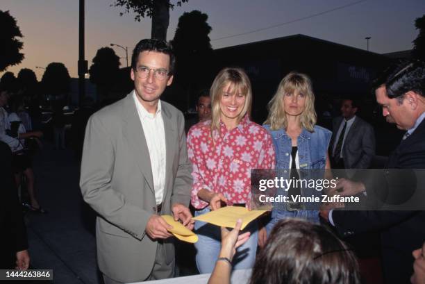 Robert Carradine, wife Edie Mani and an unidentified woman attend the grand opening party for Grand Havana Room at Canon Restaurant in Beverly Hills,...