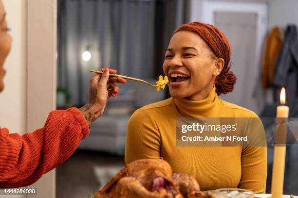 lgbt friendsgiving - macaroni and cheese stock pictures, royalty-free photos & images